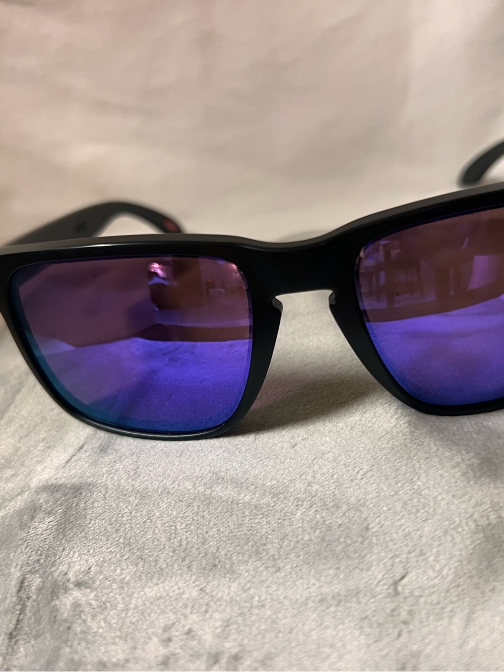 Oakleys Black Frame Sunglasses with Prizm violet  Mirrored Lenses